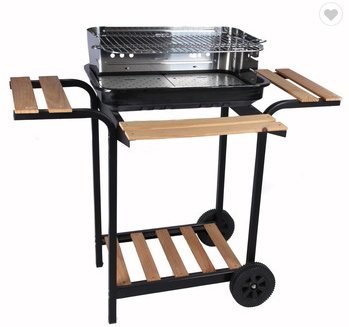 Outdoor kitchen charcoal grill barbecue with wooden tables